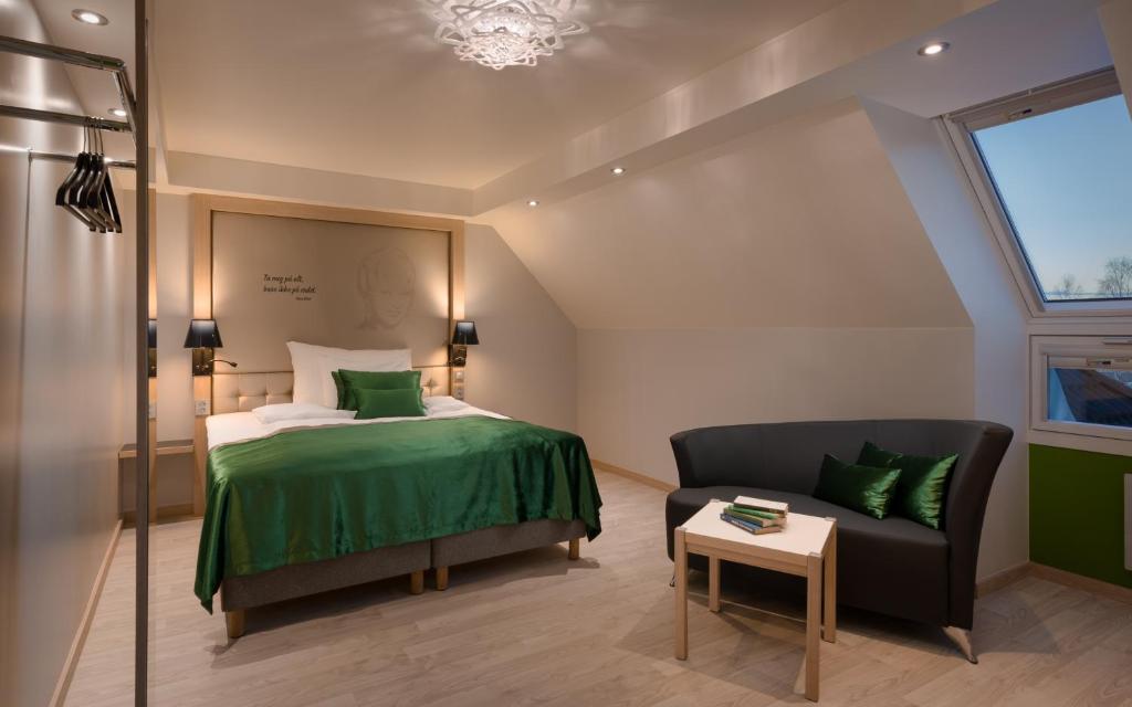 Postel nebo postele na pokoji v ubytování Quality Hotel Olavsgaard