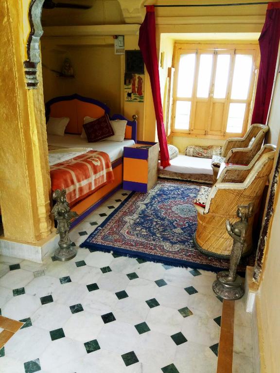 Postel nebo postele na pokoji v ubytování Hotel Paradise