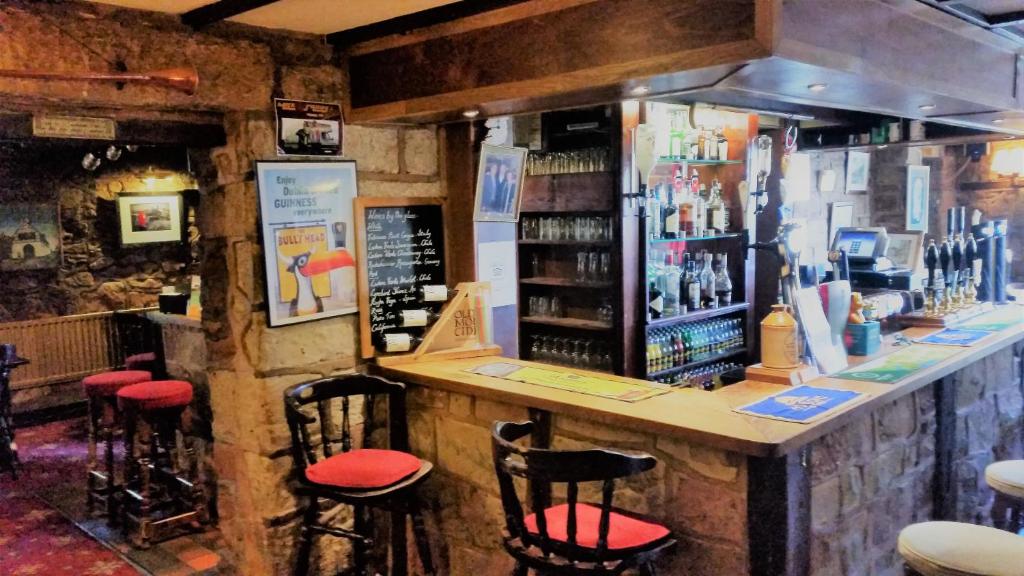 Lounge nebo bar v ubytování The Bull's Head Inn