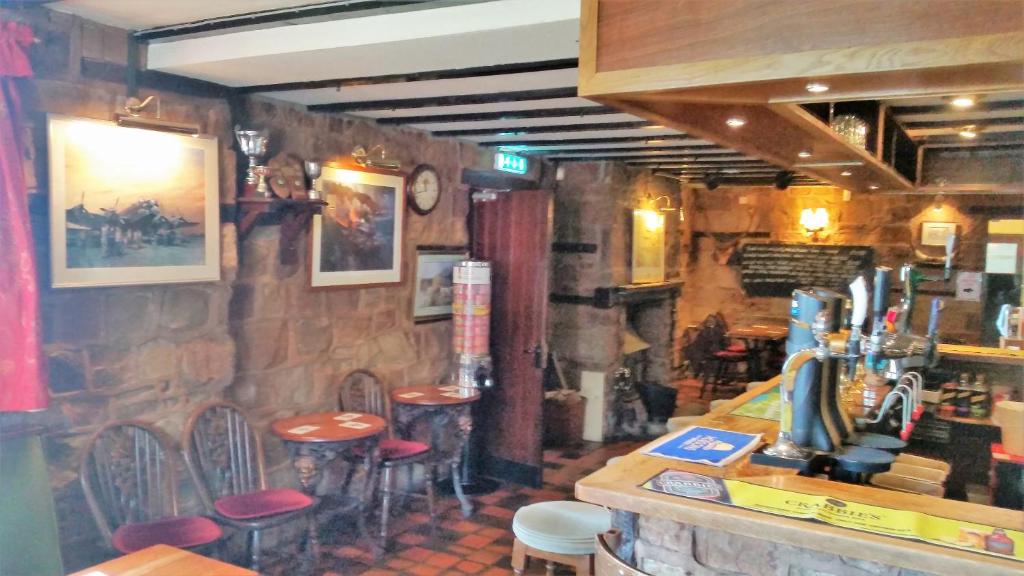 Lounge nebo bar v ubytování The Bull's Head Inn
