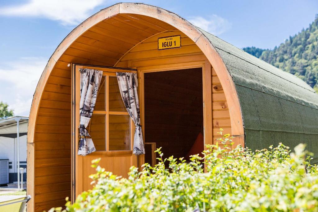 a small dome house with a sign on the door at Camping Lazy Rancho - Eiger - Mönch - Jungfrau - Interlaken in Interlaken