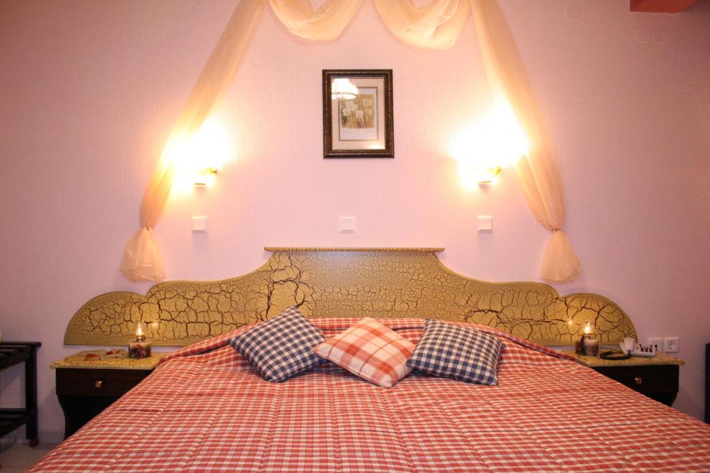 Postel nebo postele na pokoji v ubytování Hotel Maria