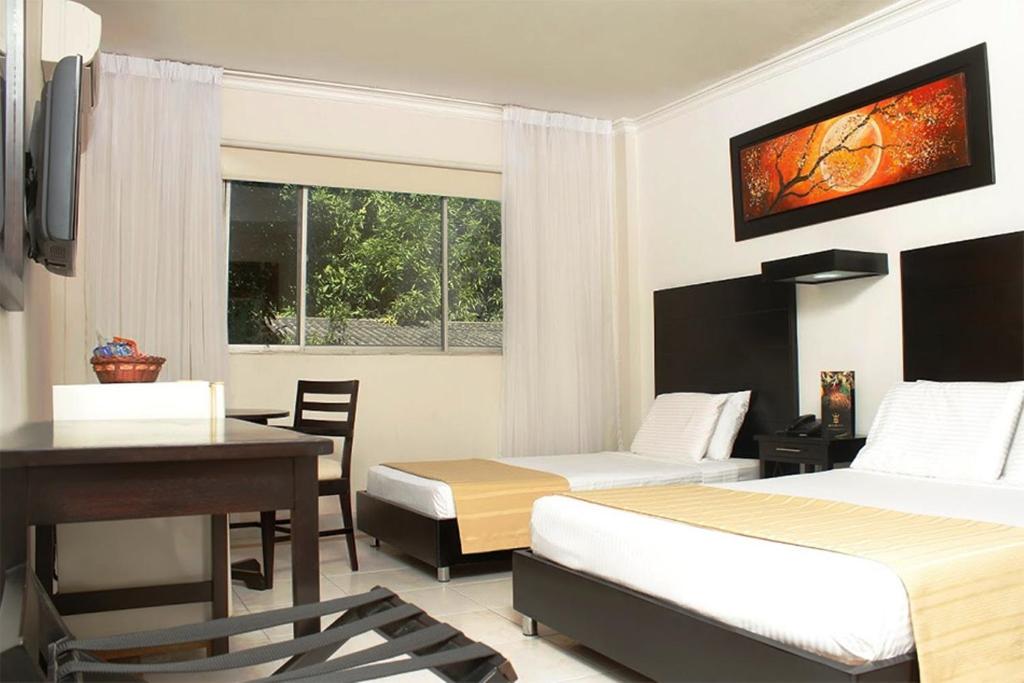 TV a/nebo společenská místnost v ubytování Hotel Genova Centro