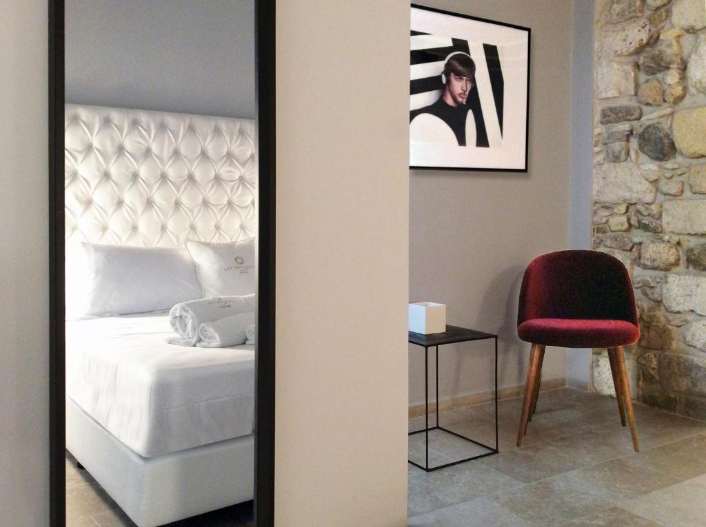 Postel nebo postele na pokoji v ubytování CinqueSuites Ortigia