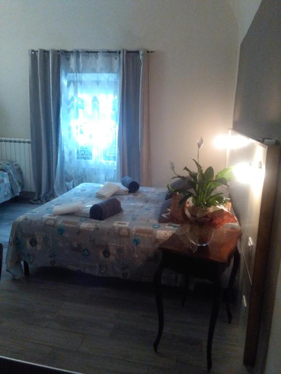Łóżko lub łóżka w pokoju w obiekcie L'artè