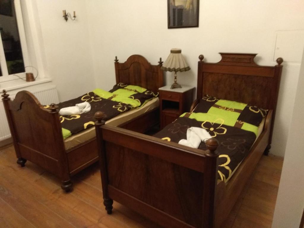 Postel nebo postele na pokoji v ubytování Penzion u Čermáka