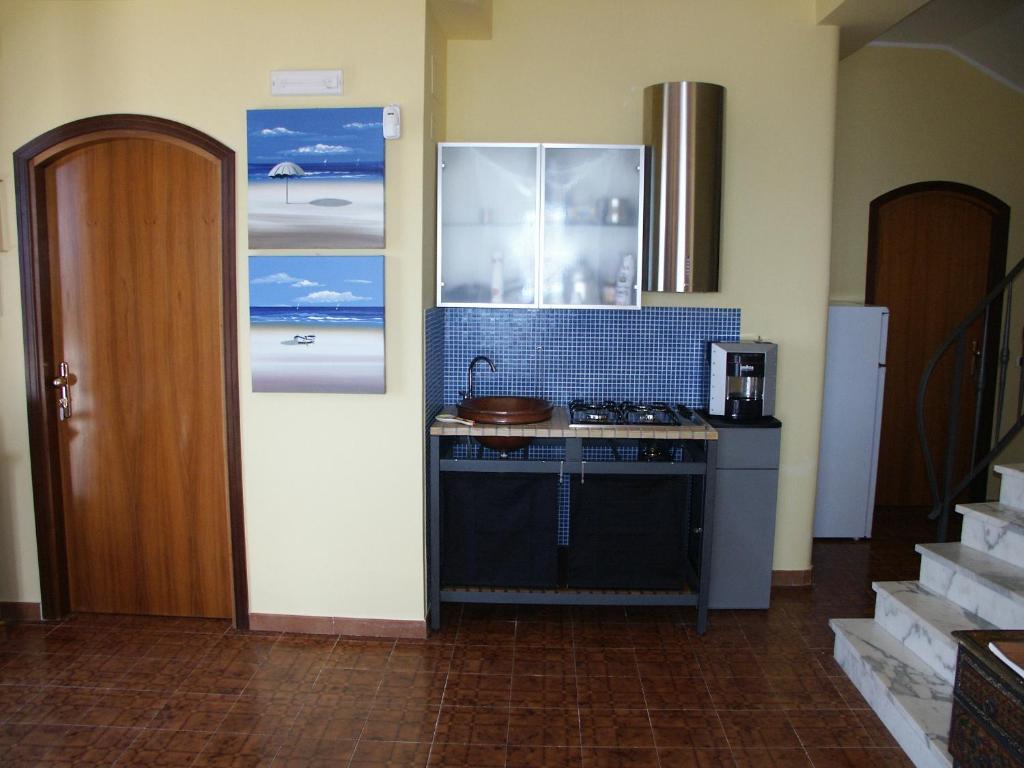 Kuchyň nebo kuchyňský kout v ubytování Terrazza sul Plemmirio
