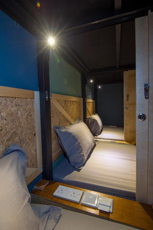 Postel nebo postele na pokoji v ubytování Finess Basic Hotel