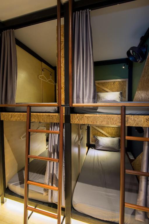 Postel nebo postele na pokoji v ubytování Finess Basic Hotel