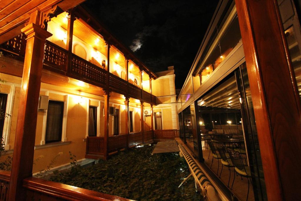 an empty courtyard of a building at night at GTM Kapan in Tbilisi City
