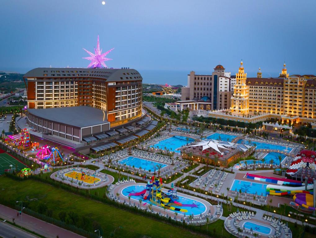 an aerial view of a resort with two pools at Royal Seginus in Lara