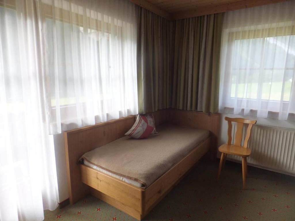 Postel nebo postele na pokoji v ubytování Haus Feldbründl