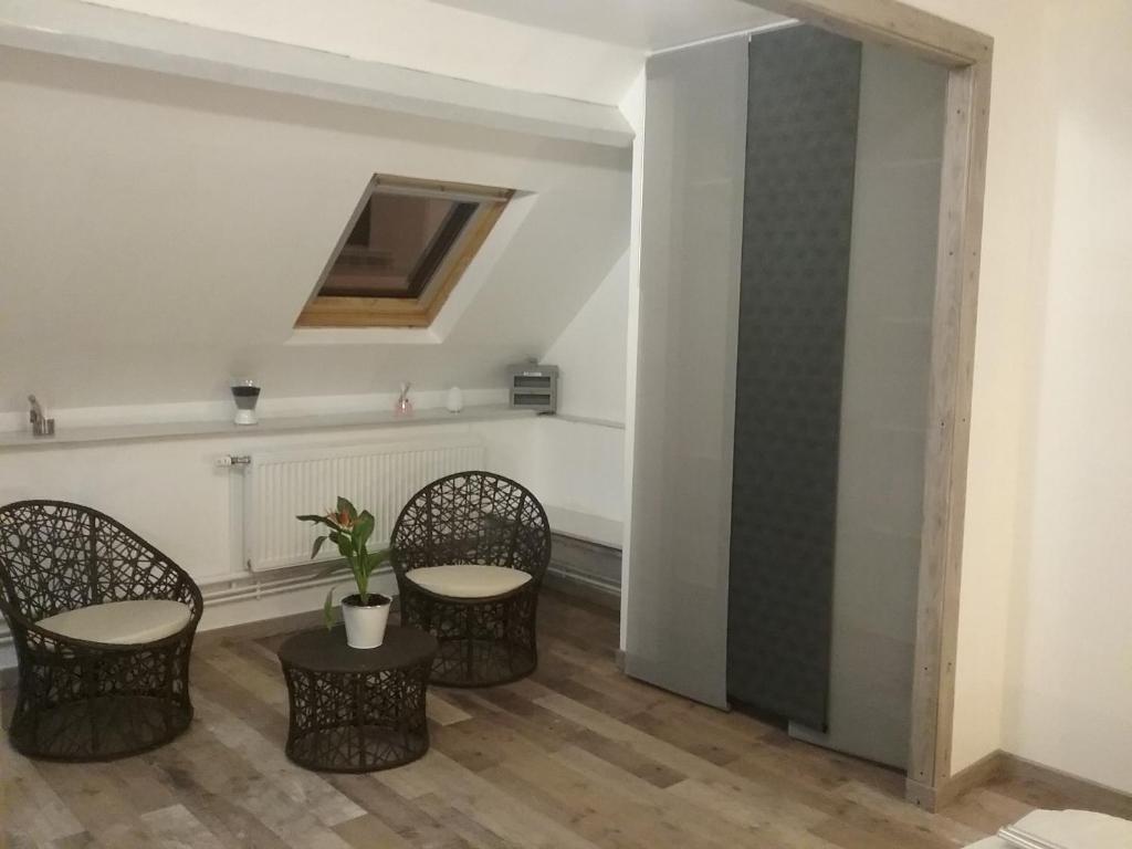 Posezení v ubytování Chambre d'hôtes "COQUELICOT"