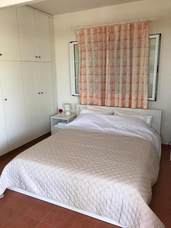 Postel nebo postele na pokoji v ubytování Inglessata Rose