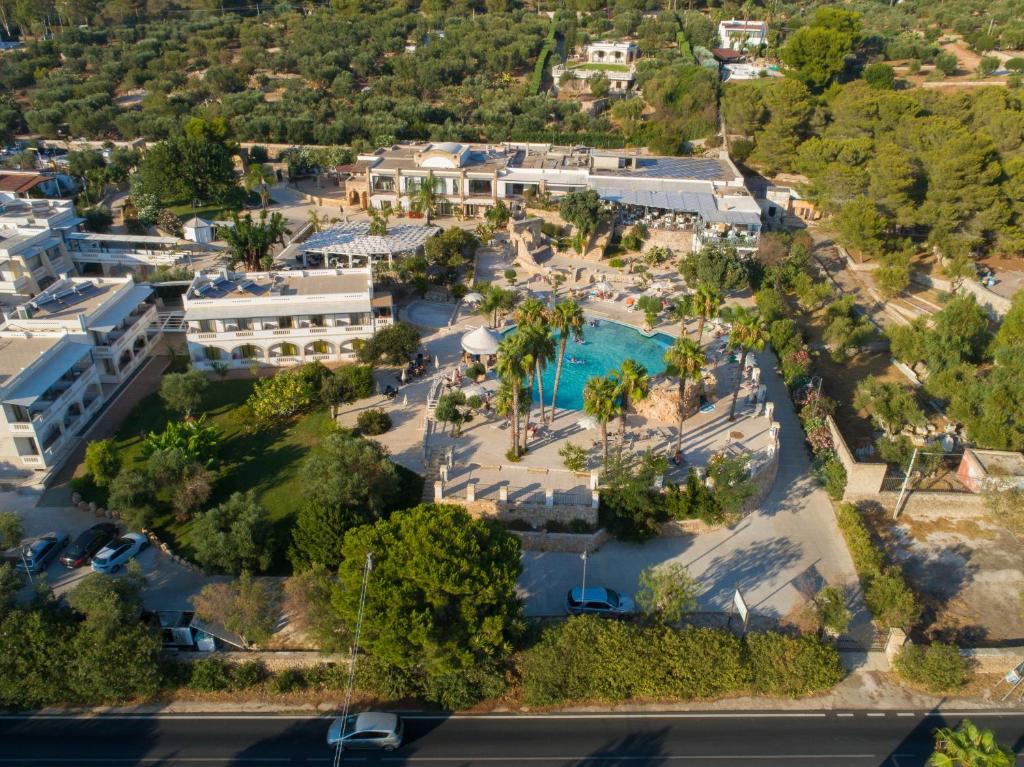 an aerial view of a resort with a pool at Eden Resort Country in Torre San Giovanni Ugento