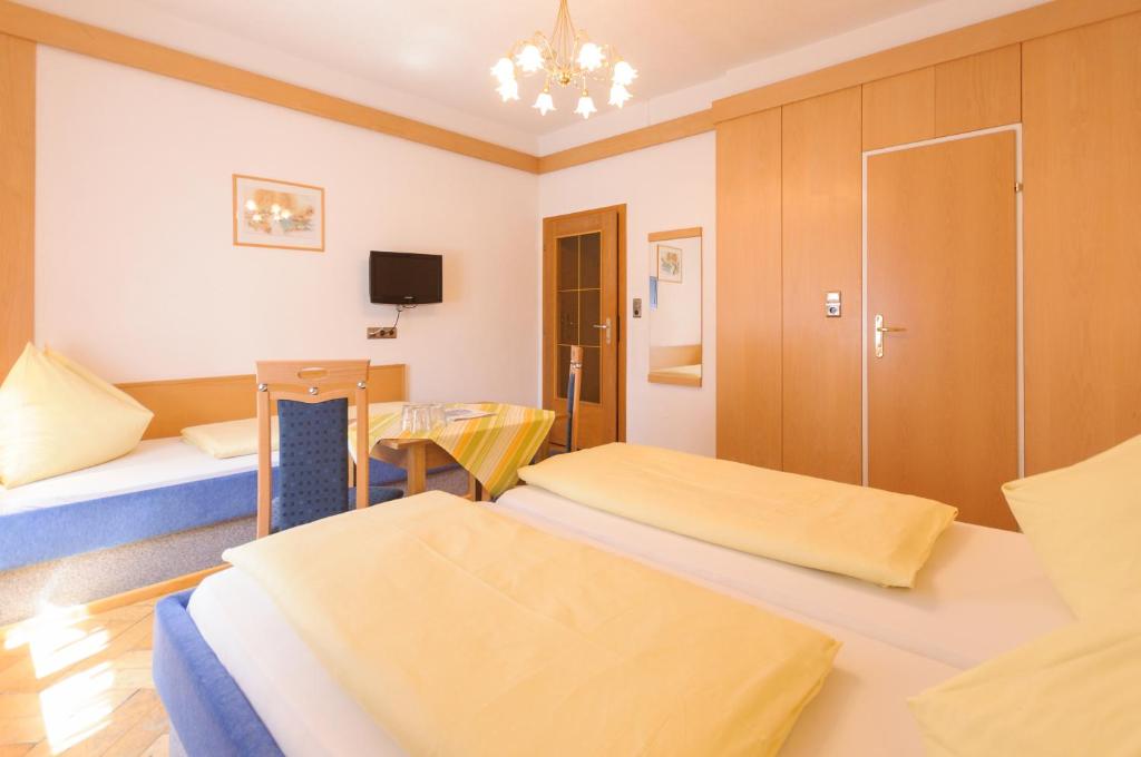 Postel nebo postele na pokoji v ubytování Hotel Tautermann