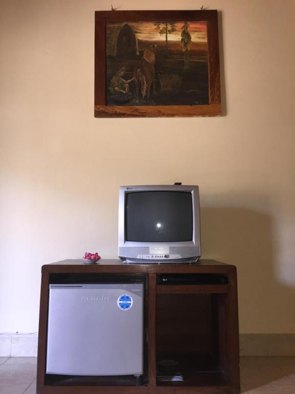 TV a/nebo společenská místnost v ubytování Rumah Saga