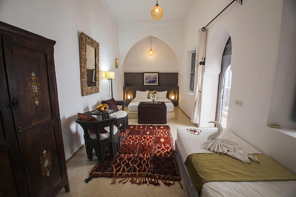 Postel nebo postele na pokoji v ubytování Riad De Vinci & SPA