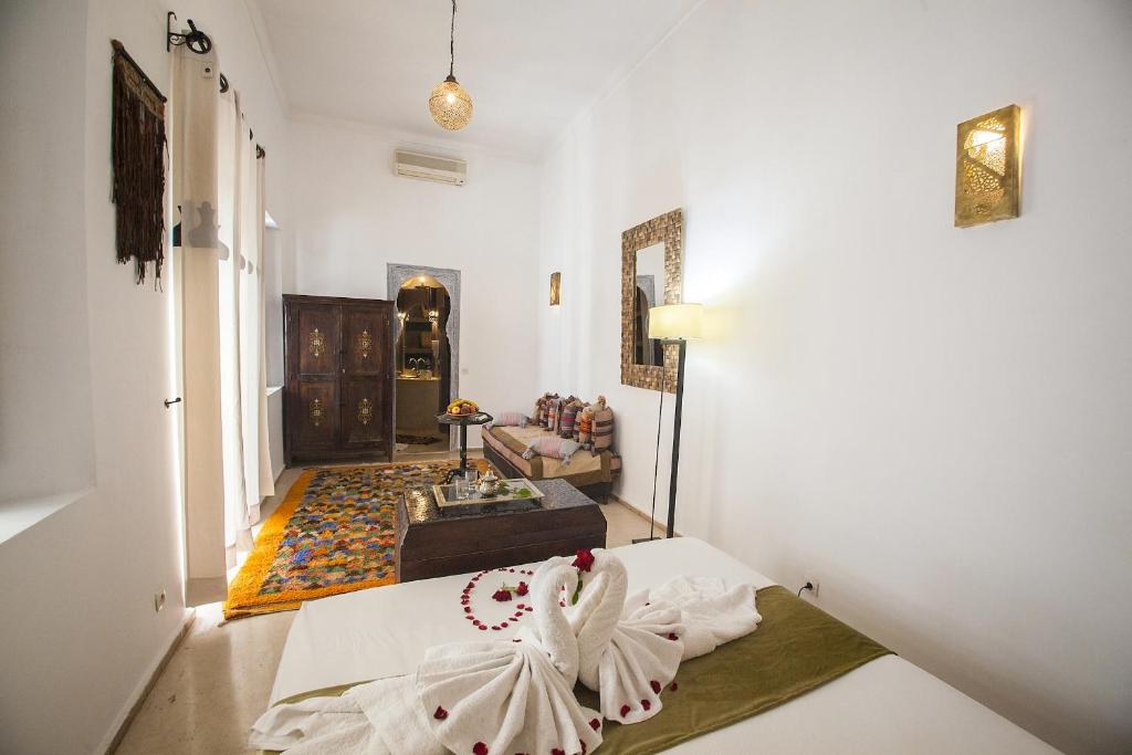 Postel nebo postele na pokoji v ubytování Riad De Vinci & SPA