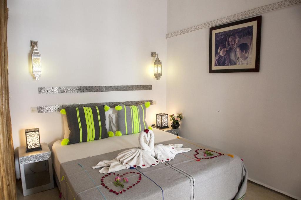 Postel nebo postele na pokoji v ubytování Riad De Vinci & SPA