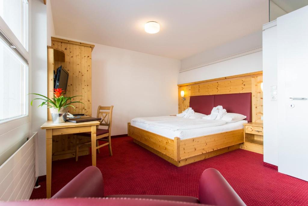 Postel nebo postele na pokoji v ubytování all inclusive Hotel Lohmann