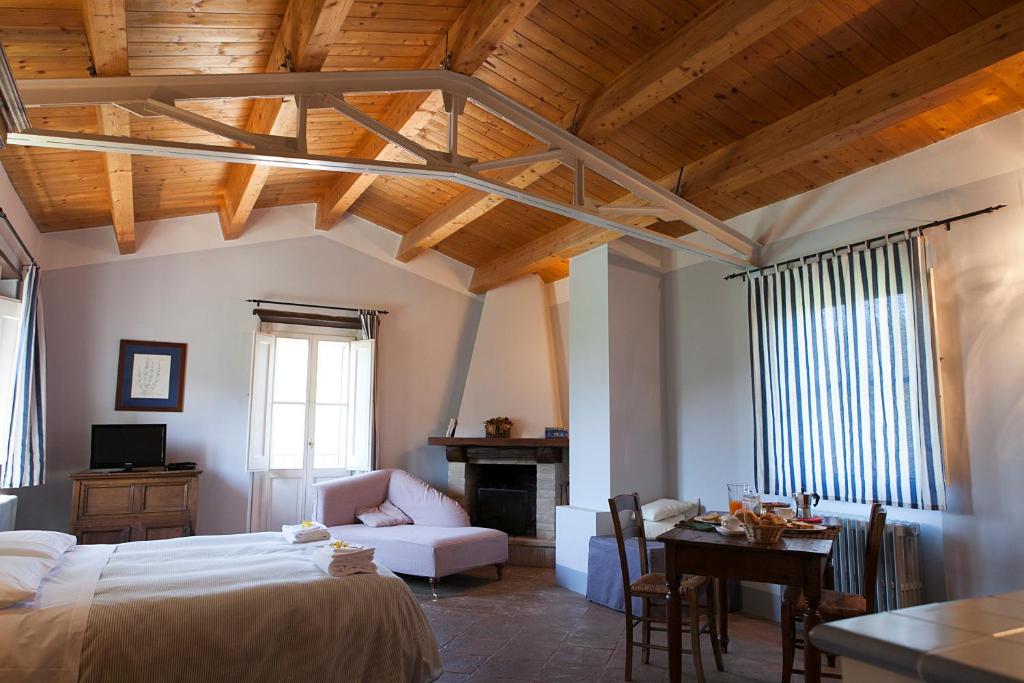 Cama ou camas em um quarto em Re Artù Assisi Country Lifestyle