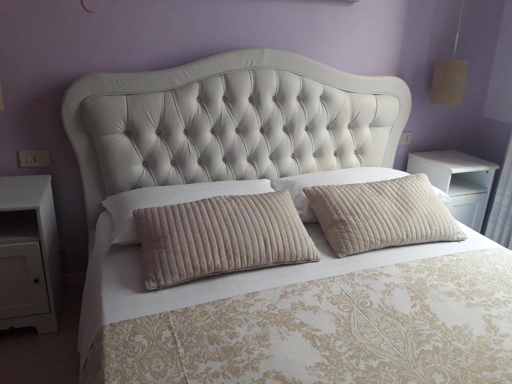 
A bed or beds in a room at B&B Villa D'Este
