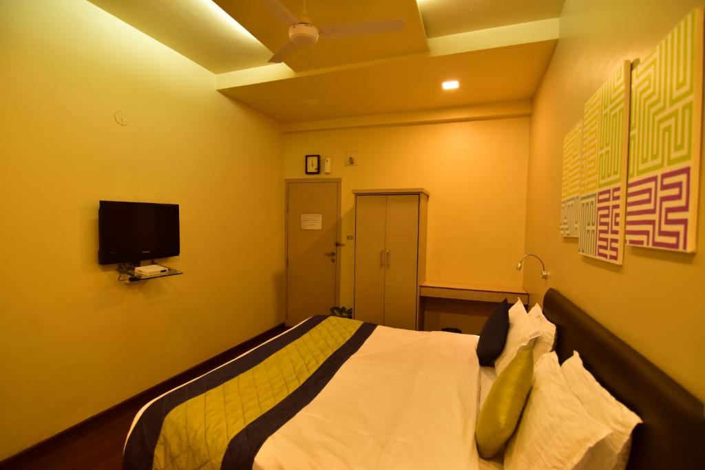 TV a/nebo společenská místnost v ubytování MY Bizz Hotel Sapna