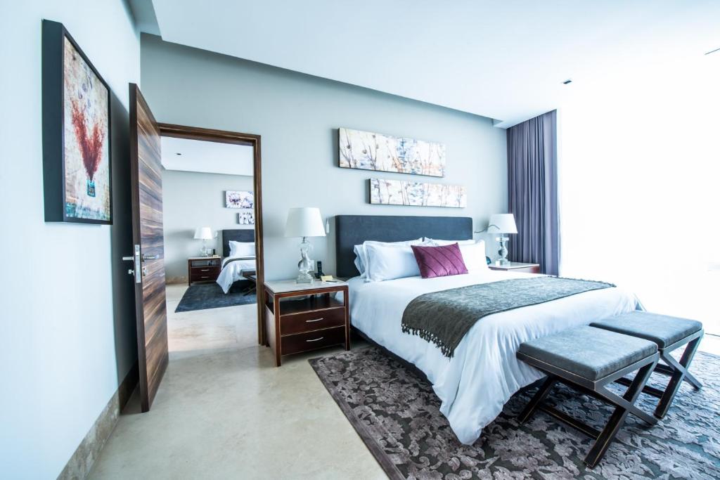 Postel nebo postele na pokoji v ubytování Square Small Luxury Hotel - Providencia