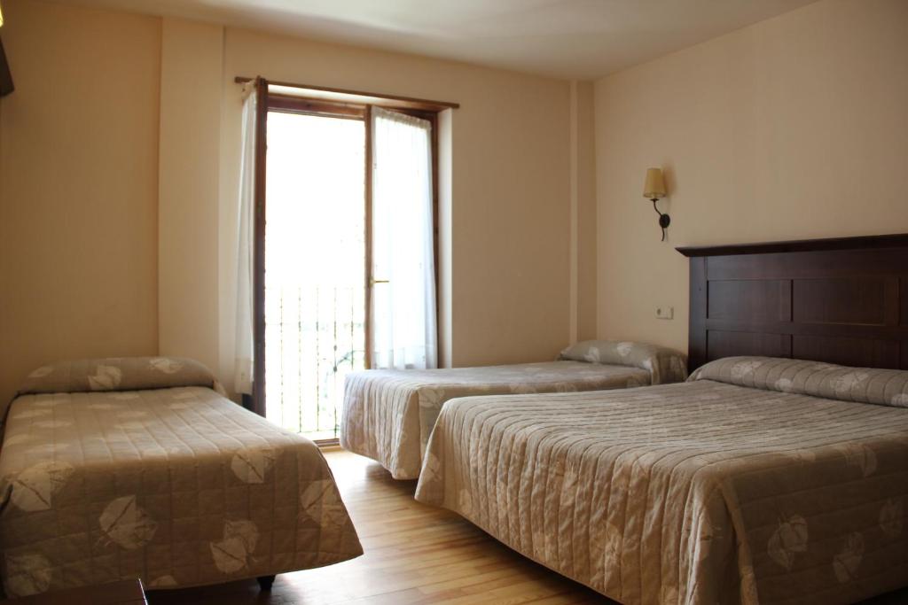Postel nebo postele na pokoji v ubytování Hotel Rantiner