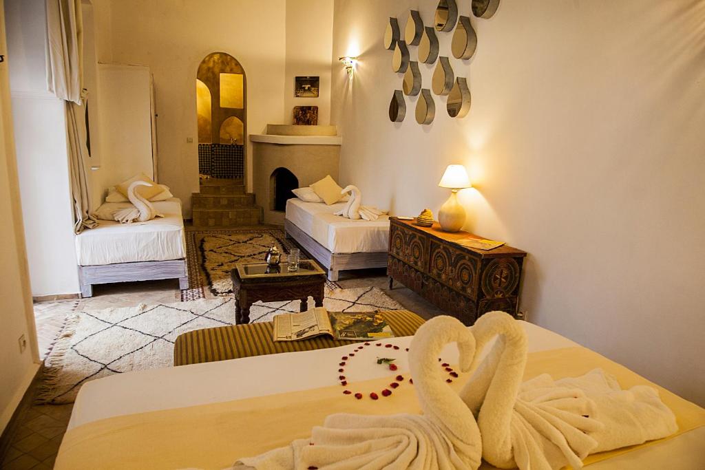 Postel nebo postele na pokoji v ubytování Riad De Vinci & SPA