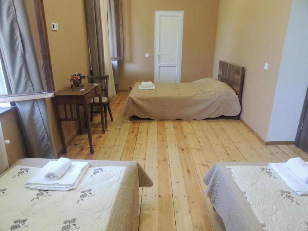 Postel nebo postele na pokoji v ubytování Guest House Chirina