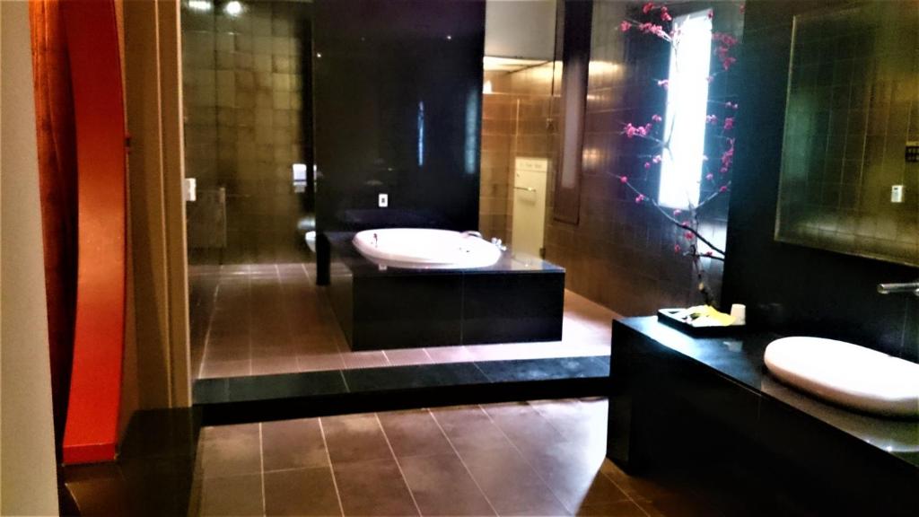 Koupelna v ubytování Her Home Spa Motel Xinying
