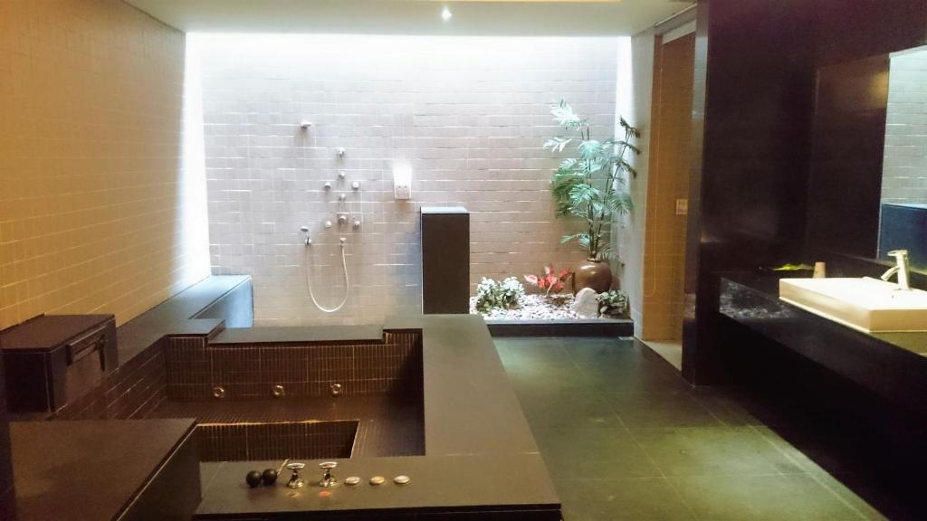 Koupelna v ubytování Her Home Spa Motel Xinying