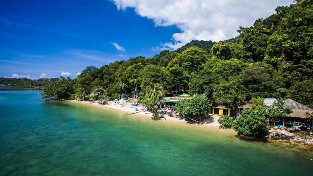 an island with a beach and trees in the water at Indie Beach Bungalows in Ko Chang