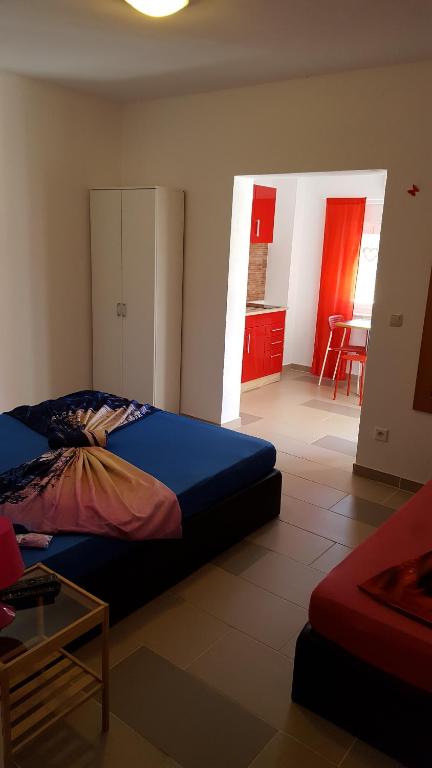 Posteľ alebo postele v izbe v ubytovaní Apartments Megi