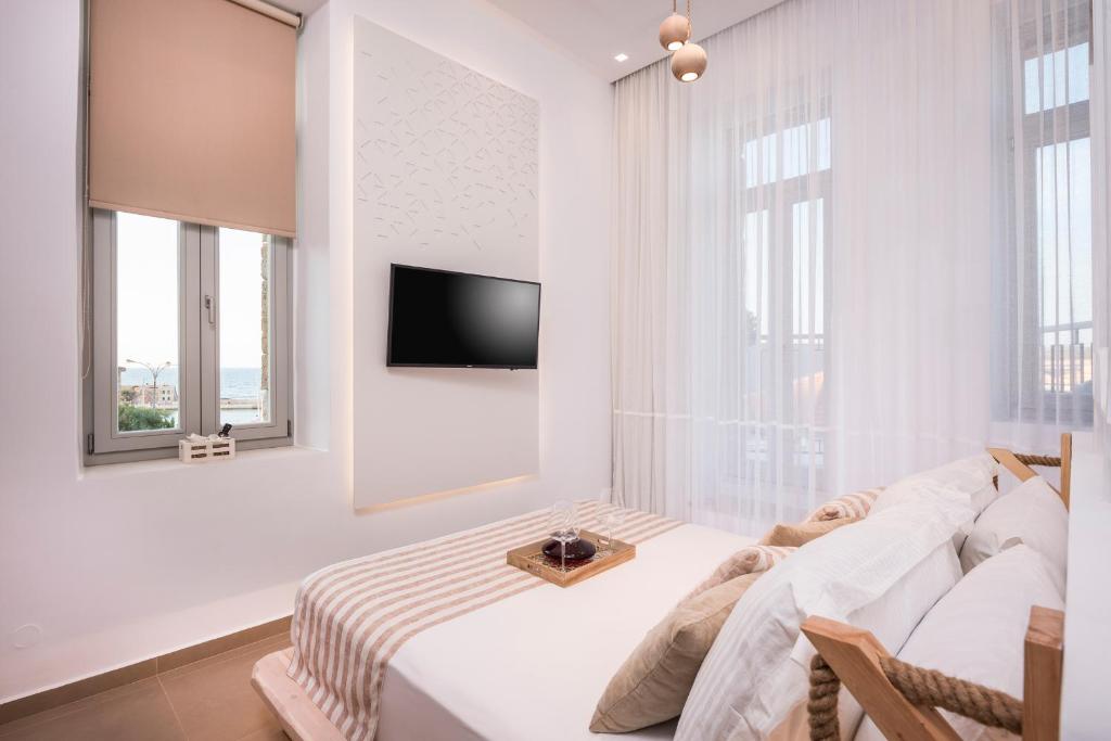 A bed or beds in a room at Madonna del Mare
