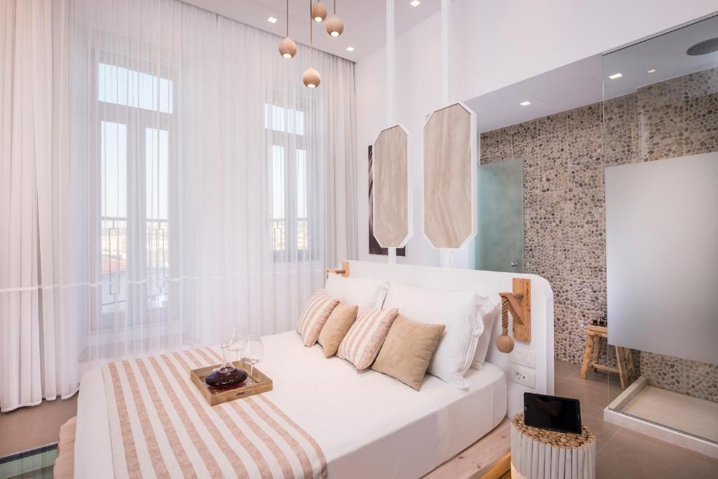 A bed or beds in a room at Madonna del Mare