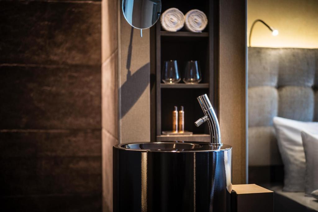 Cama ou camas em um quarto em SAKS Urban Design Hotel Frankfurt