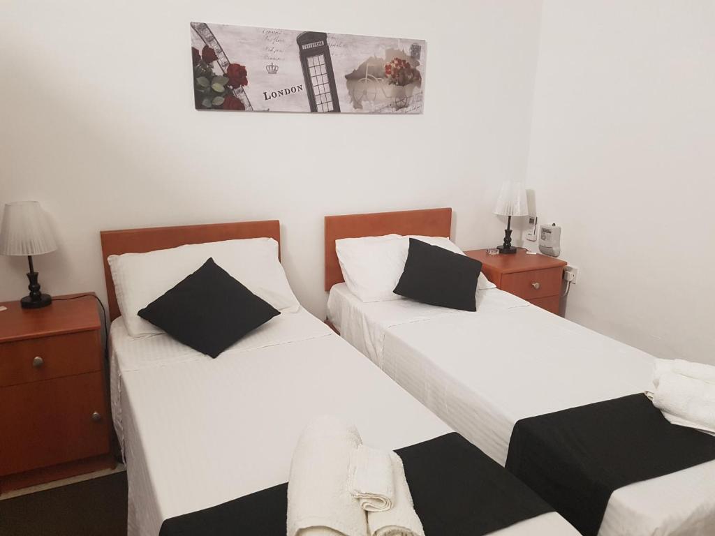 Postel nebo postele na pokoji v ubytování D'Ambrogio Guest House