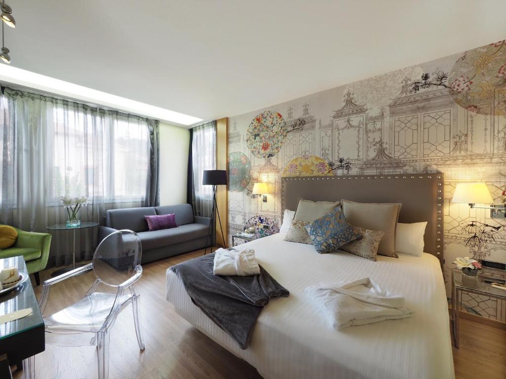 Postel nebo postele na pokoji v ubytování Vilana Hotel Boutique