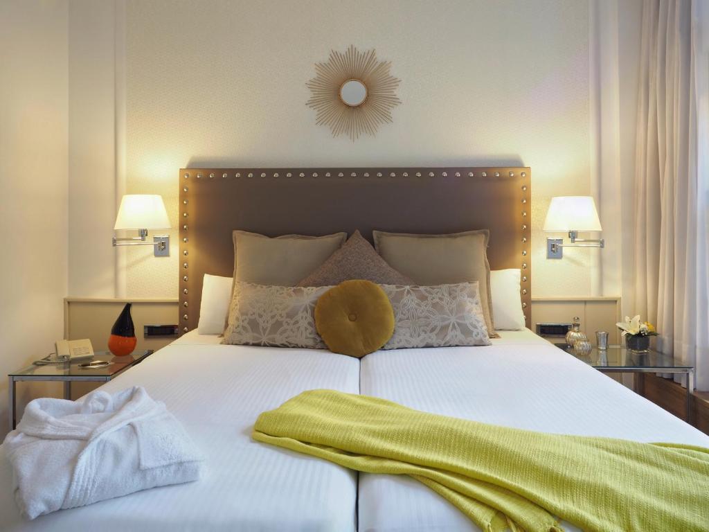 Postel nebo postele na pokoji v ubytování Vilana Hotel Boutique