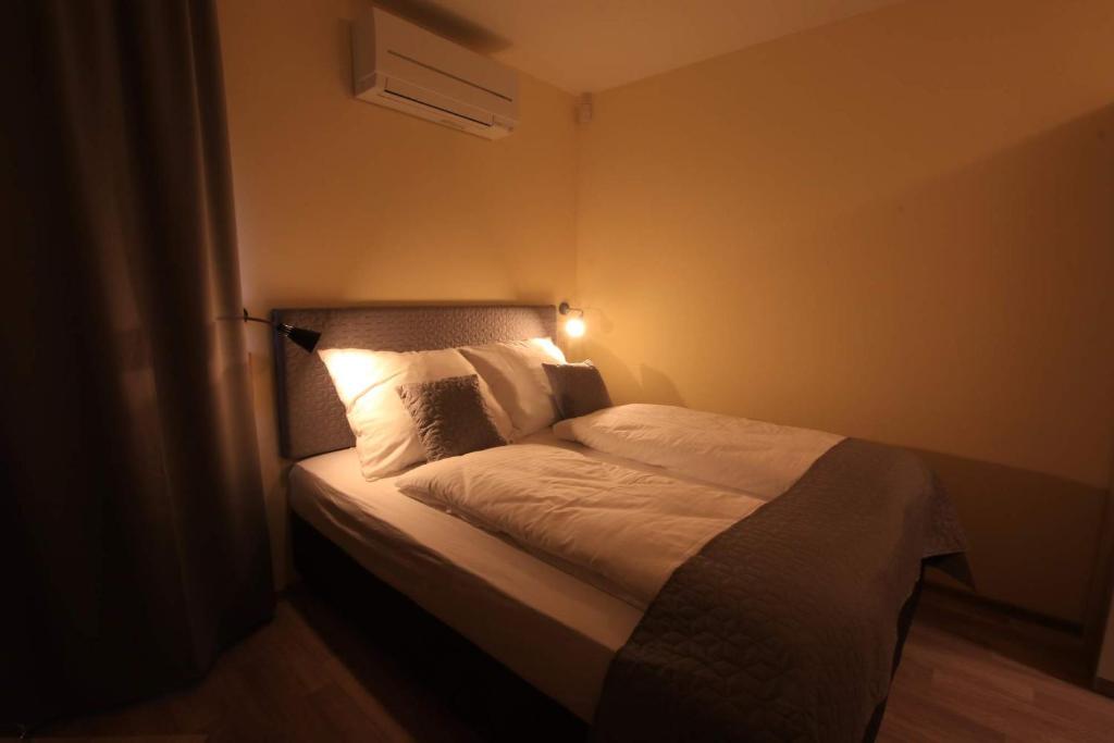 Postel nebo postele na pokoji v ubytování U Admirala