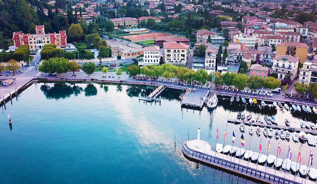 an aerial view of a river with a city at La Vittoria Boutique Hotel in Garda