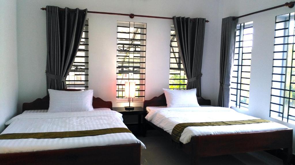 Postel nebo postele na pokoji v ubytování Anou Home - Guesthouse