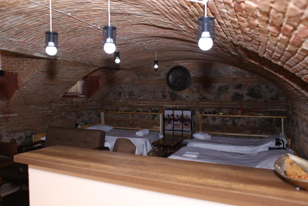 Postel nebo postele na pokoji v ubytování Guest House Kakabadzeebi 9