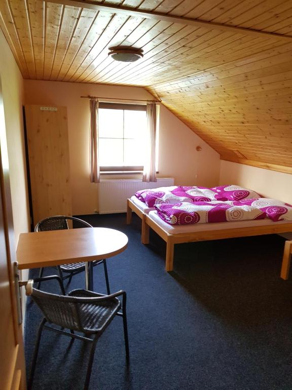 Letto o letti in una camera di Apartmany chaloupka