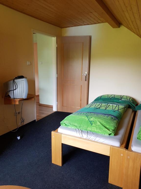 Letto o letti in una camera di Apartmany chaloupka