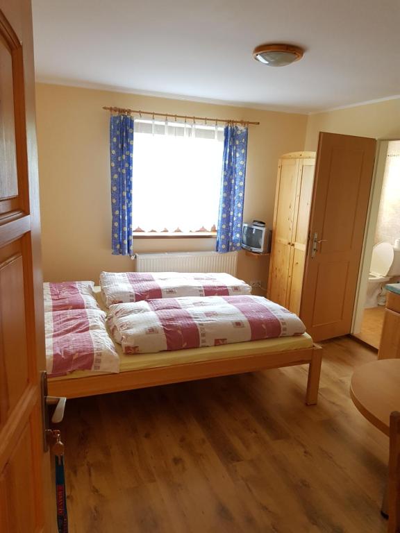 Letto o letti in una camera di Apartmany chaloupka