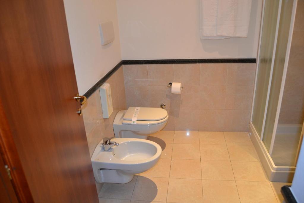 Koupelna v ubytování Hotel Due Leoni
